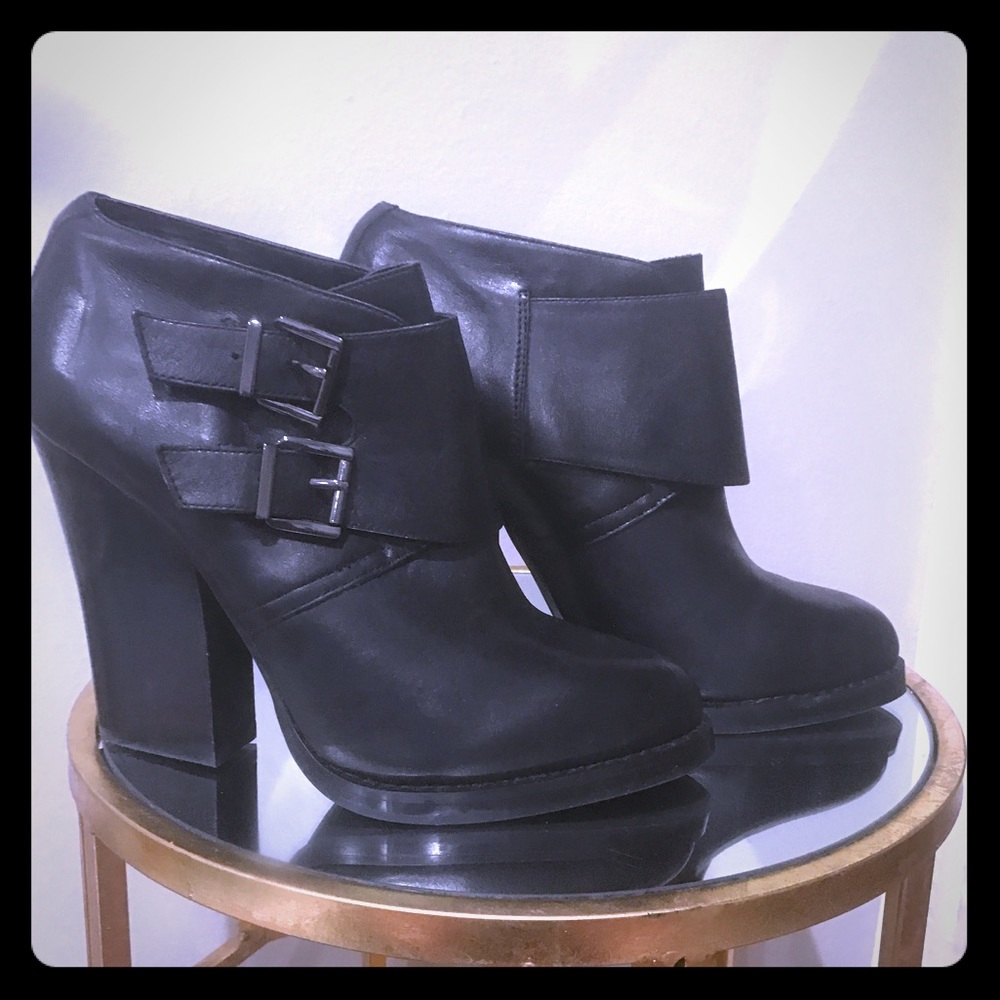 Black heeled booties.
